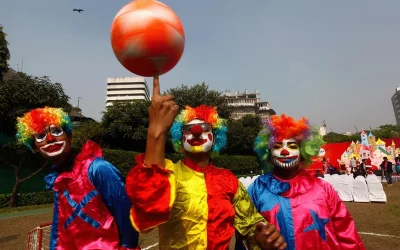 Clowns displaying tricks for the people at the Christmas gathering | Mehedi Hasan/Dhaka Tribune