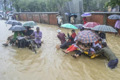 It is raining in Chittagong. The heavy rainfall is persistent, but not as persistent as the citizens of the port city.rnSeasonal winds have brought down rainclouds, submerging low-lying parts of the city in knee-deep to waist-deep water | Rabin Chowdhury/Dhaka Tribune
