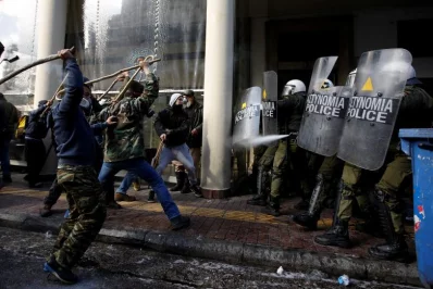 Farmers from the island of Crete clash with riot police during a demonstration outside the Agriculture Ministry in Athens, GreecernrnREUTERS