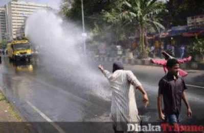 Hartal supporters being sprayed down with water cannon MAHMUD HOSSAIN OPU/DHAKA TRIBUNE