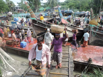 No one can afford to sit idle. The fleet of trawlers (which are anchoring at the landing station) is growing in number with each passing day | Dhaka Tribune