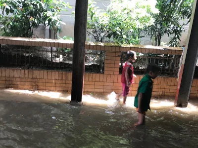 Even children are affected by the flooding, as it limits their opportunities to play outside. Photo: MD FAZLUR RAHMAN/DHAKA TRIBUNE