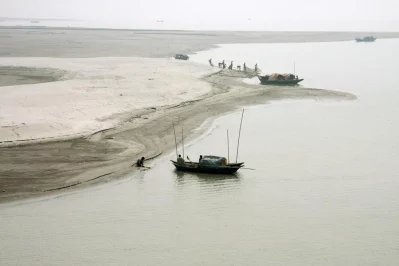 Boats anchored near a sandbar of Jamuna River in Sirajganj
