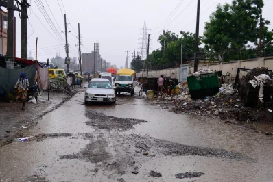 Cars and vehicles move along in the rain  | Mahmud Hossain Opu