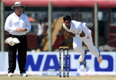 Bangladesh cricketer Mustafizur Rahman delivers a ball on the first day of the opening Test match between Sri Lanka and Bangladesh at the Galle International Cricket Stadium in Galle on March 7, 2017 AFP
