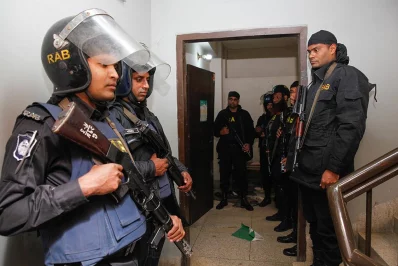 Members of RAB inside the Nakhalpara militant den following the raid on Friday, January 12, 2018. The militants were reportedly holed up on the fourth floor of the building | Mehedi Hasan/Dhaka Tribune