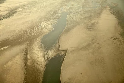 This photo, showing the Padmas dire state, was taken from the Hardinge Bridge