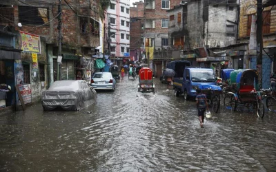 In Dhakau2019s historic Agamasi Lane, the denizens of Old Dhaka went about their daily schedule with little regard to the waterlogging | Mehedi Hasan/Dhaka Tribune