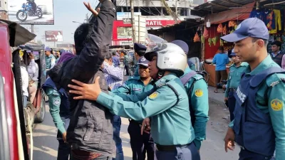 Police stops and searches a man in Rajshahi on February 7, 2018 prior to Khaleda Zias verdict | Dhaka Tribune 