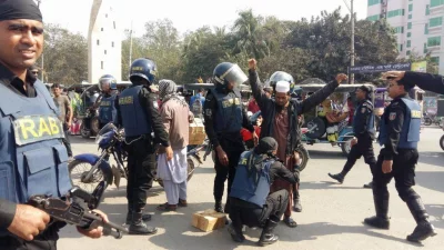 Police stops a biker and searches him in Rajshahi on February 7, 2018 prior to Khaleda Zias verdict | Dhaka Tribune 