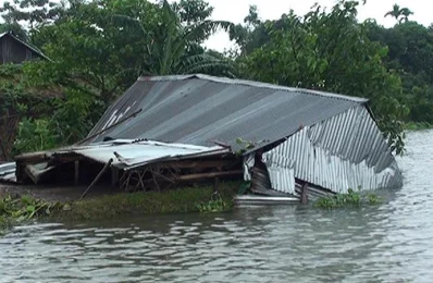 Although the torrential rain has lessened, the water is still flowing down from Meghalaya upstream through Surma river | Dhaka Tribune