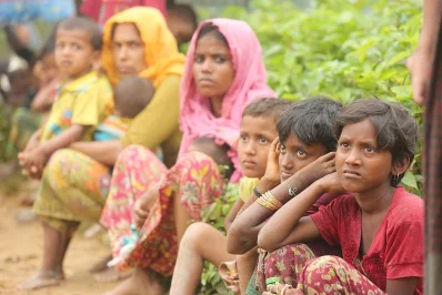 Waiting to enter  - Rohingya women and children wait in queues outside the Kutupalong camp in Coxu2019s Bazar for shelter. The photo was taken on September 6, 2017 | Syed Zakir Hossain/Dhaka Tribune