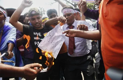 Protestors burning certificates to show their frustration on the age limit for government jobs | Mehedi Hasan/Dhaka Tribune