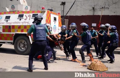 Police try and tackle down a protester during the price hike protest MAHMUD HOSSAIN OPU/DHAKA TRIBUNE