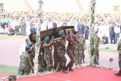 Members of the Bangladesh Army carry the coffin of one of the US-Bangla plane crash victims on stage for the namaj-e-janaza at Bangladesh Army Stadium on Monday | Syed Zakir Hossain/Dhaka Tribune