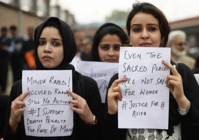 Kashmiri lawyers hold placards during a protest calling for justice following the recent rape and murder case of an eight-year-old girl in the Indian state of Jammu and Kashmir, in Srinagar on April 16, 2018 | AFP