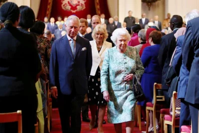 Britains Queen Elizabeth and Prince Charles leave after the formal opening of the Commonwealth Heads of Government Meeting in the ballroom at Buckingham Palace in London, Britain, April 19, 2018 | Reuters