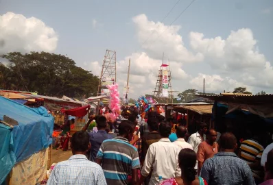 Devotees flock into the premises of Kumbho Mela on the bank of Kadam Bari Dighi in Rajair upazila, Madaripur on Monday, May 28, 2018. According to legends, the first Kumbho Mela was held in 1881, with 13 sages, 13 kg of rice, and Tk13 on the 13th day of Jaishtha, the second month of the Bangla calendar, imitating the Kumbho Mela in India