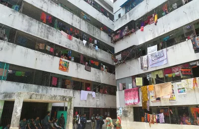 Police take position in front of a building in Ganaktuli area on May 27, 2018 | Mahmud Hossain Opu/Dhaka Tribune