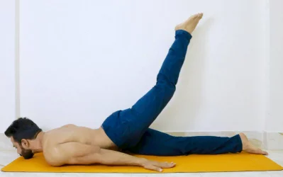 Half locust - This pose strengthens the muscles of the spine and the buttocks, improves blood circulation in the back area to remove the back pain. nnLie on your stomach with chin on the floor, legs together and arms to your sides, palms on the. Now inhale, and, using the back and leg muscles lift the right leg as high as possible keeping the toes pointing back. Make sure that your hip stays on the ground and the pelvis remains in a neutral position. Stay in the posture for 30 second to 1 minute breathing normally. Try to keep the shoulders broad. Exhale, lower your right leg down and inhale, repeat on the other side. Take a rest for 30 seconds.