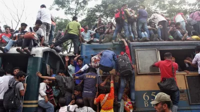Passenger desperate to go home to celebrate Eid with loved ones, even the engine room of a train is getting overcrowded | Rajib Dhar/Dhaka Tribune