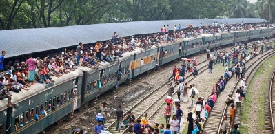 Every year, every Eid, this exact same scene repeats itself. The eagerness to return home, bracing the danger of illegally perching on top of a train, because people are already spilling out of the compartments, has become a recurring trope of Eid holidays in Bangladesh | Mehedi Hasan/Dhaka Tribune