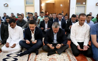This handout picture released on June 15, 2018, by the Jordanian Royal Palace, shows King Abdullah II (C) and his son Crown Prince Hussein bin Abdullah (L) performing the morning prayers during the celebrations of Eid al-Fitr in Aqaba, southern Jordan | AFP