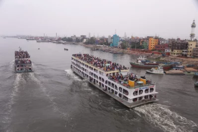 Two vessels leave Dhakas Sadarghat, laden with people heading home for Eid-ul-Fitr Mehedi Hasan
