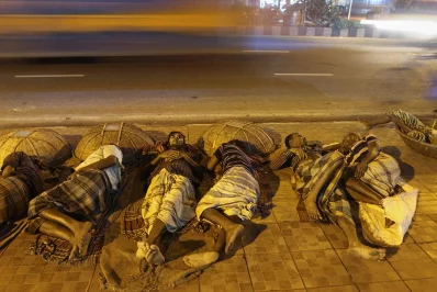 At late hours when we are sleeping peacefully on our comfortable mattresses, thousands of people are homeless and living on the streets of Dhaka city, seen here in Kawran Bazar. These people have no special story to tell, but the mere need to survive. These labourers find themselves resting on footpaths, stations, only using their baskets as a head-rest. This little rest they get before the early morning rush to menial, toiling, labour helps them survive another day of struggle.