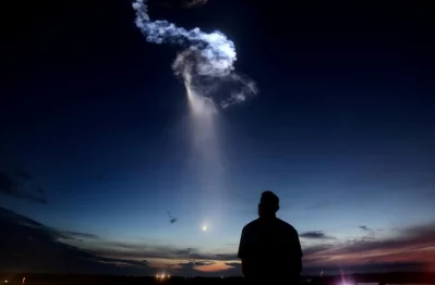 A SpaceX Falcon 9 rocket exits the atmosphere for a cargo resupply mission to the International Space Station, over Cape Canaveral, Florida | Reuters