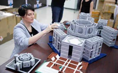 LEGO enthusiast Juditha Ohlmacher assembles her diorama of the national assembly building at ToyCon 2018 on July 20, 2018 | Mahmud Hossain Opu/Dhaka Tribune