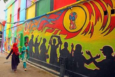 Whereas most fans in Bangladesh tend to hoist flags of countries they support, streets of Kolta Bazar are painted lively colours with football motifs