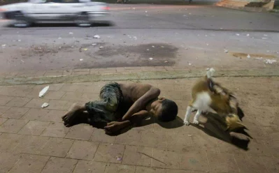 They say beggars cannot be choosers. Truly, the homeless do not have the option to choose how they live. Just like this child at TSC Chattar. These children sleep in the streets everyday, often joined by stray dogs.
