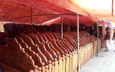 Different kinds of wooden furniture are on display at the fair
