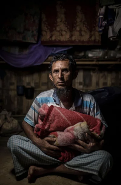 Mosi-Ullah, 60: My wife is blind and was sick when we were forced to abandon our villages. I wrapped my wife in this blanket and carried her all the way to Bangladesh. This is all I could bring with me from Myanmar.Ahmer Khan/Amnesty International