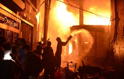 Locals try to douse the fire in Haji Wahed Mansion at Nanda Kumar Lane in Chawkbazaru2019s Churihatta area of Old Dhaka on Thursday, February 21, 2019 Mahmud Hossain Opu/Dhaka Tribune