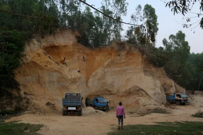 Brick kilns in Bandarban district are taking a toll on the environment of the hilly region. Brick makers are illegally cutting off hills to provide raw material for the kilns, and cutting down trees to provide fuel. Photos of the hills razed by illegal cutting were taken in Lama upazilau2019s Faitong area, while the brick kiln was in Choinga area Syed Zakir Hossain/Dhaka Tribune
