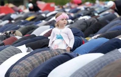 A girl is seen as Albanian Muslims attend the morning prayers of Eid al-Fitr, marking the end of the holy month of Ramadan in Skanderbeg square Tirana, Albania on June 4, 2019 REUTERS