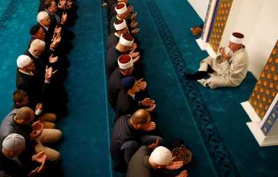 Muslims pray during Eid al-Fitr celebrations in 16th century Aladza Mosque in Foca, Bosnia and Herzegovina on June 4, 2019 REUTERS
