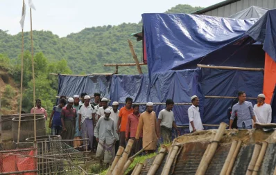 Several Rohingya men on their way to an interview with UNHCR and RRRC representatives at Camp No 26, Shalbagan, Teknaf Syed Zakir Hossain/Dhaka Tribune
