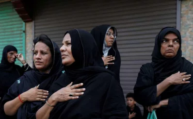 Shiite Muslim women beat their chest during a religious procession ahead of Ashura in Karachi, Pakistan, September 9, 2019 |Reuters