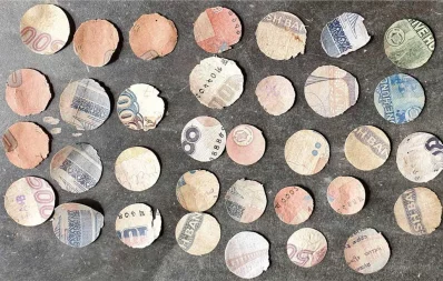 Rejected Bangladesh Bank notes found in Bogra marshland