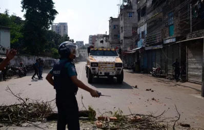 An armored police vehicle at the site of the clash in Mohammadpur Geneva Camp in Dhaka on Saturday, October 5, 2019 Mahmud Hossain Opu/ Dhaka Tribune