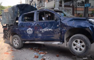 The reamins of the vandalized police van in the area of the clash in Mohammadpur Geneva Camp in Dhaka on Saturday, October 5, 2019 Mahmud Hossain Opu/ Dhaka Tribune