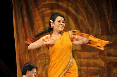 Tamalika Karmaker performs in Aranyak Natyadalu2019s play Moyurshinghashon at Mahila Samity Hall in Bailey Road on Dashami |nFacebook