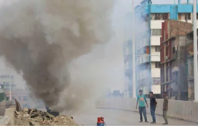 Smoke comming form burning tar in the open air at a road construction site in Dhaka  on Monday, November 25, 2019Mehedi Hasan/Dhaka Tirbune