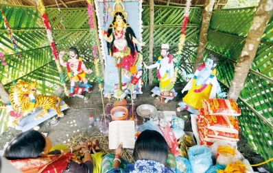 Honey collectors (moals) and fishermen perform Bonbibi Puja before embarking on their journey in the forest, for protection from tigers Syed Zakir Hossain/Dhaka Tribune