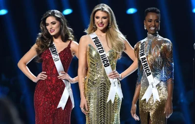 Miss Mexico Sofu00eda Aragu00f3n, Miss Puerto Rico Madison Anderson and Miss Universe 2019 Zozibini Tunzi, of South Africa, appear onstage at the 2019 Miss Universe Pageant at Tyler Perry Studios in Atlanta, Georgia on December 08, 2019 AFP