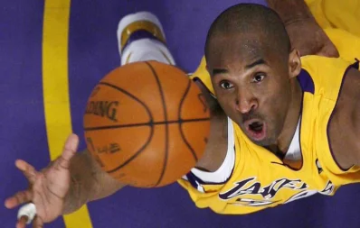 Los Angeles Lakers Kobe Bryant jumps for a rebound against the Denver Nuggets during Game 2 of their NBA Western Conference final basketball playoff game in Los Angeles on May 21, 2009 Reuters