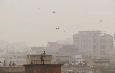 Photo shows people flying kites in the foggy skies of Dhaka on the occasion of Shakrain on Tuesday, January 14, 2020 Al Nasib Jelanee/Dhaka Tribune